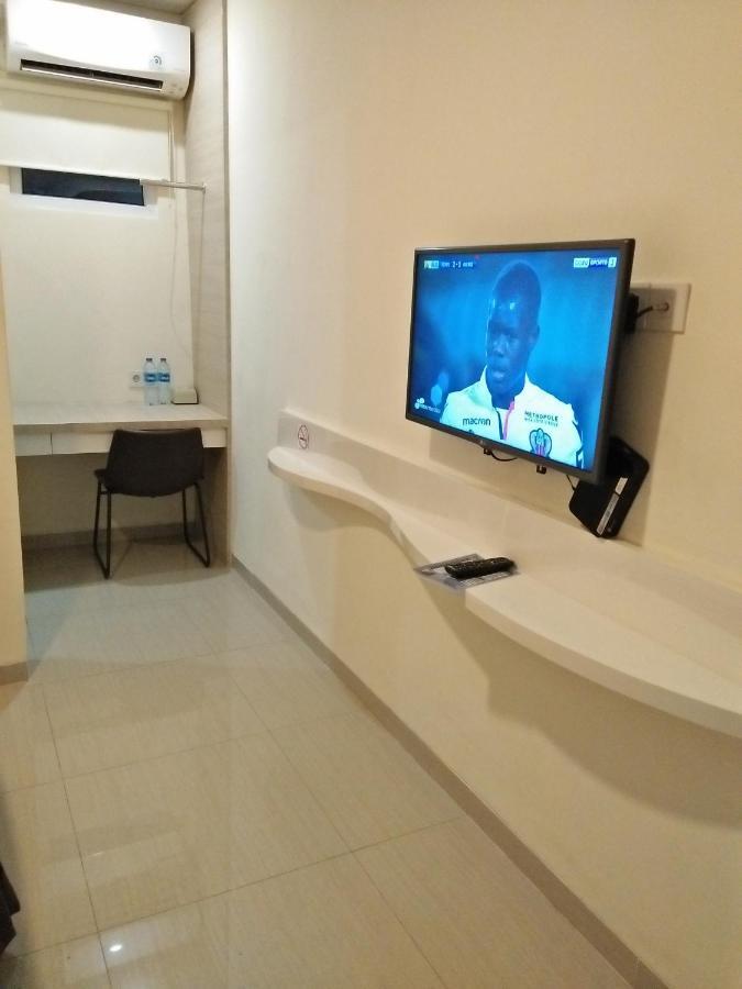 Kitara Hotel Джакарта Стая снимка