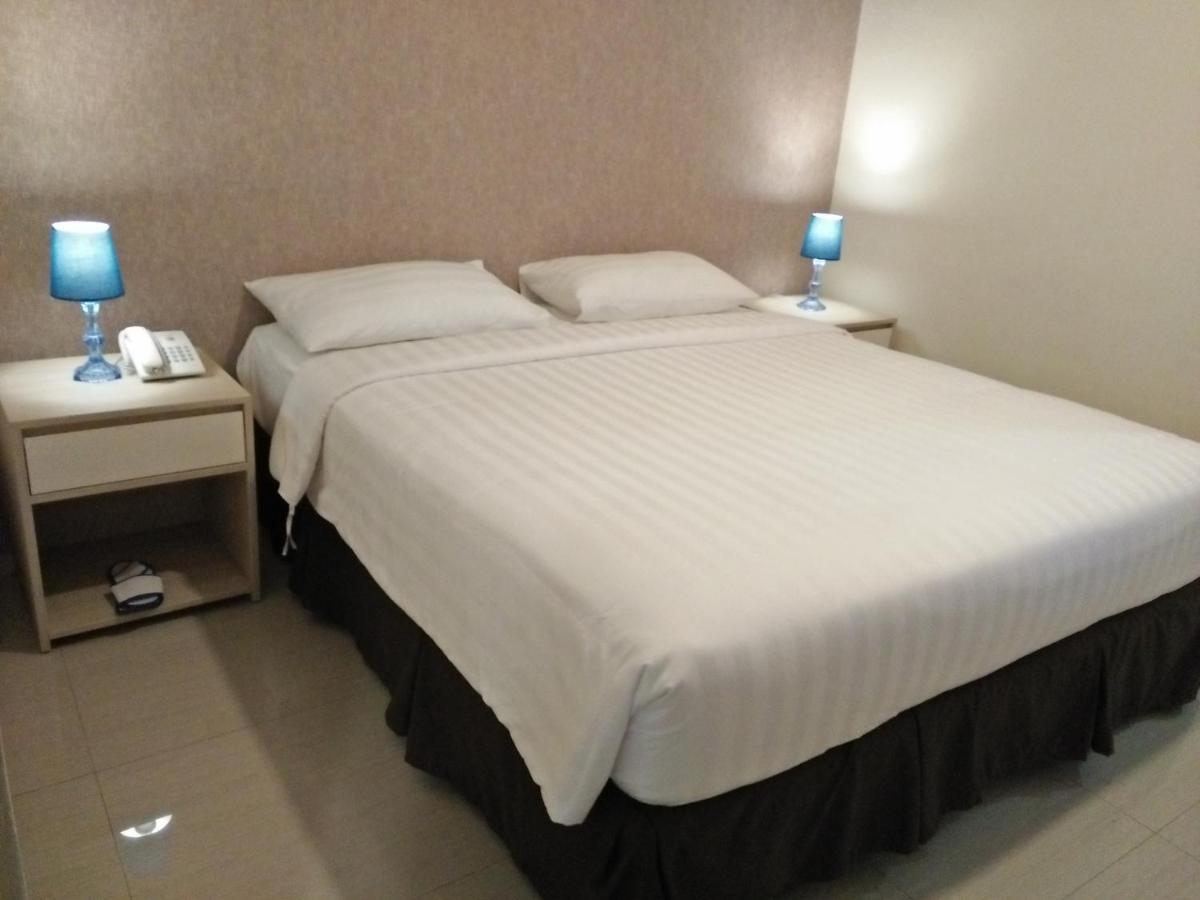 Kitara Hotel Джакарта Стая снимка
